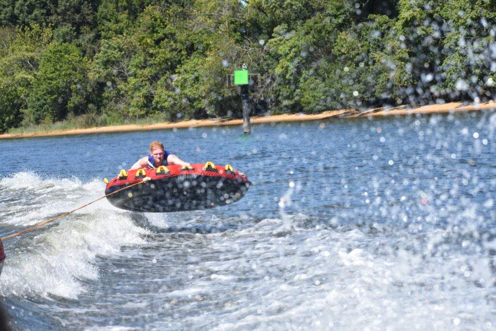 Tube jumping a wave